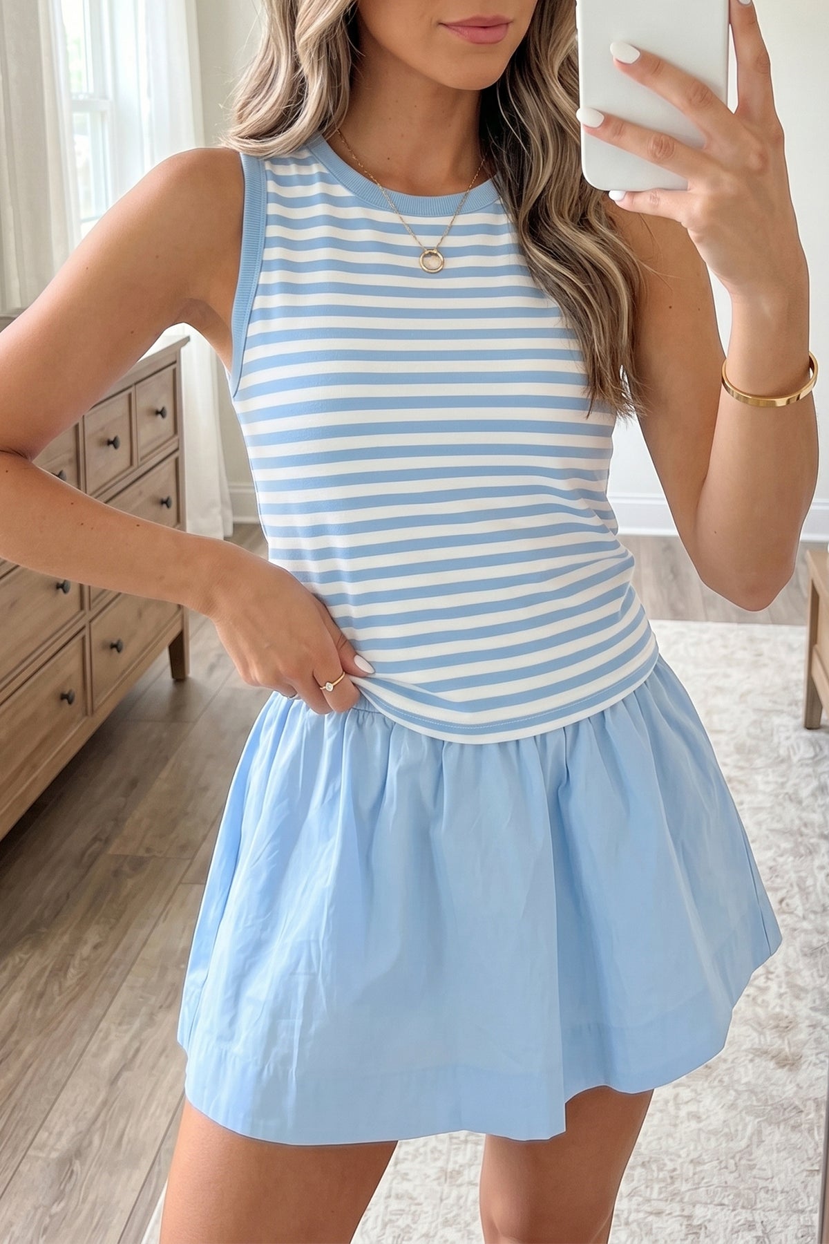 Sky blue stripe slim tank and ruffle mini skort set model front view