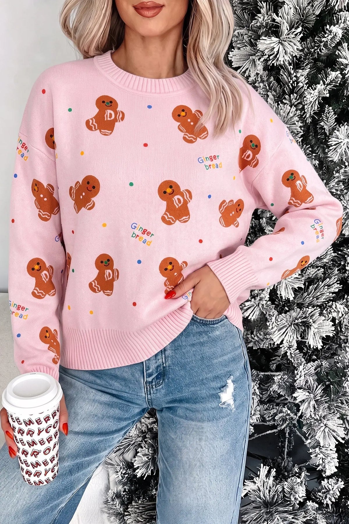 Pink Festive Gingerbread Pattern Long Sleeve Round Neck Sweater model front view · nz-alt-v1