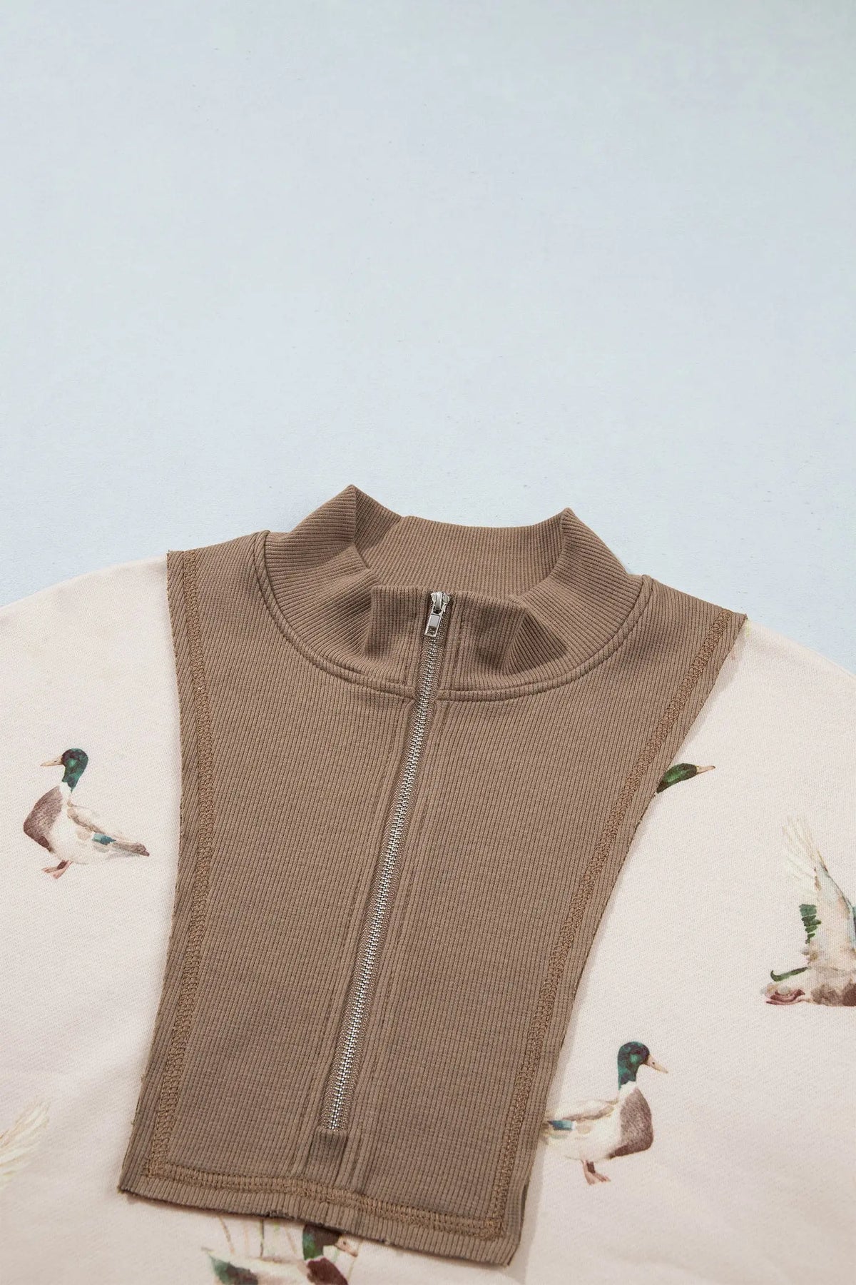 Khaki mallard print pullover brown ribbed zip front panel, detail view · nz-alt-v1