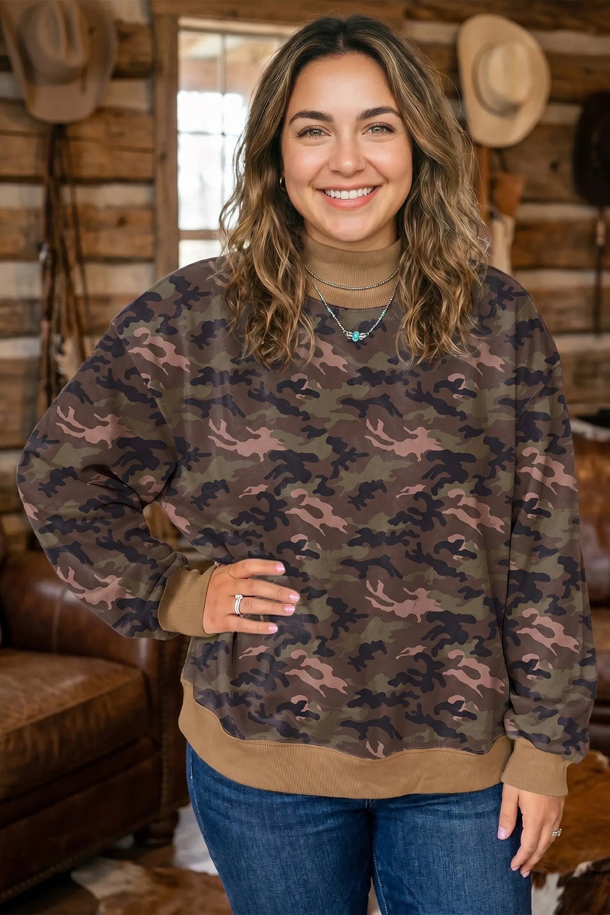 Green camouflage print high neck plus size sweatshirt model front view · nz-alt-v1