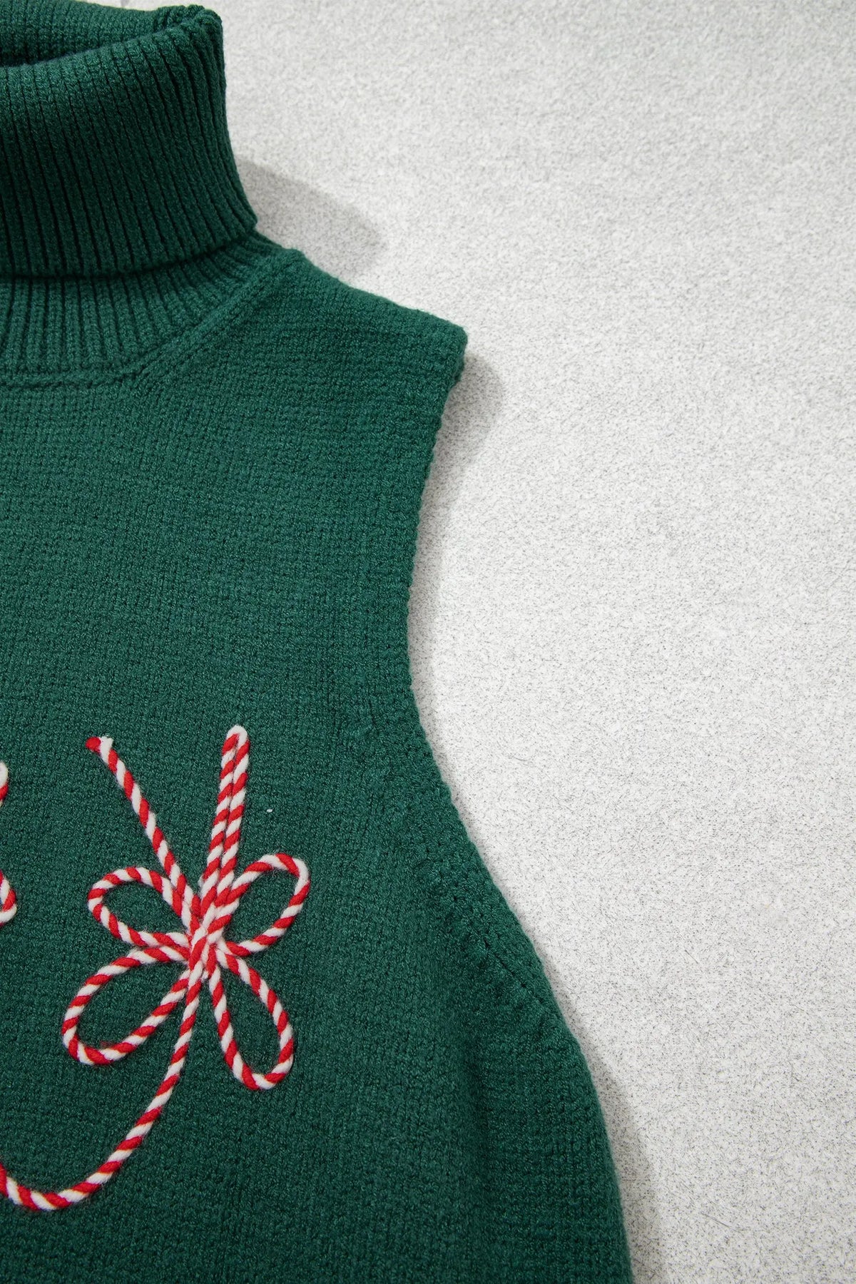 Evergreen high neck sleeveless embroidered knit sweater vest detail view · nz-alt-v1