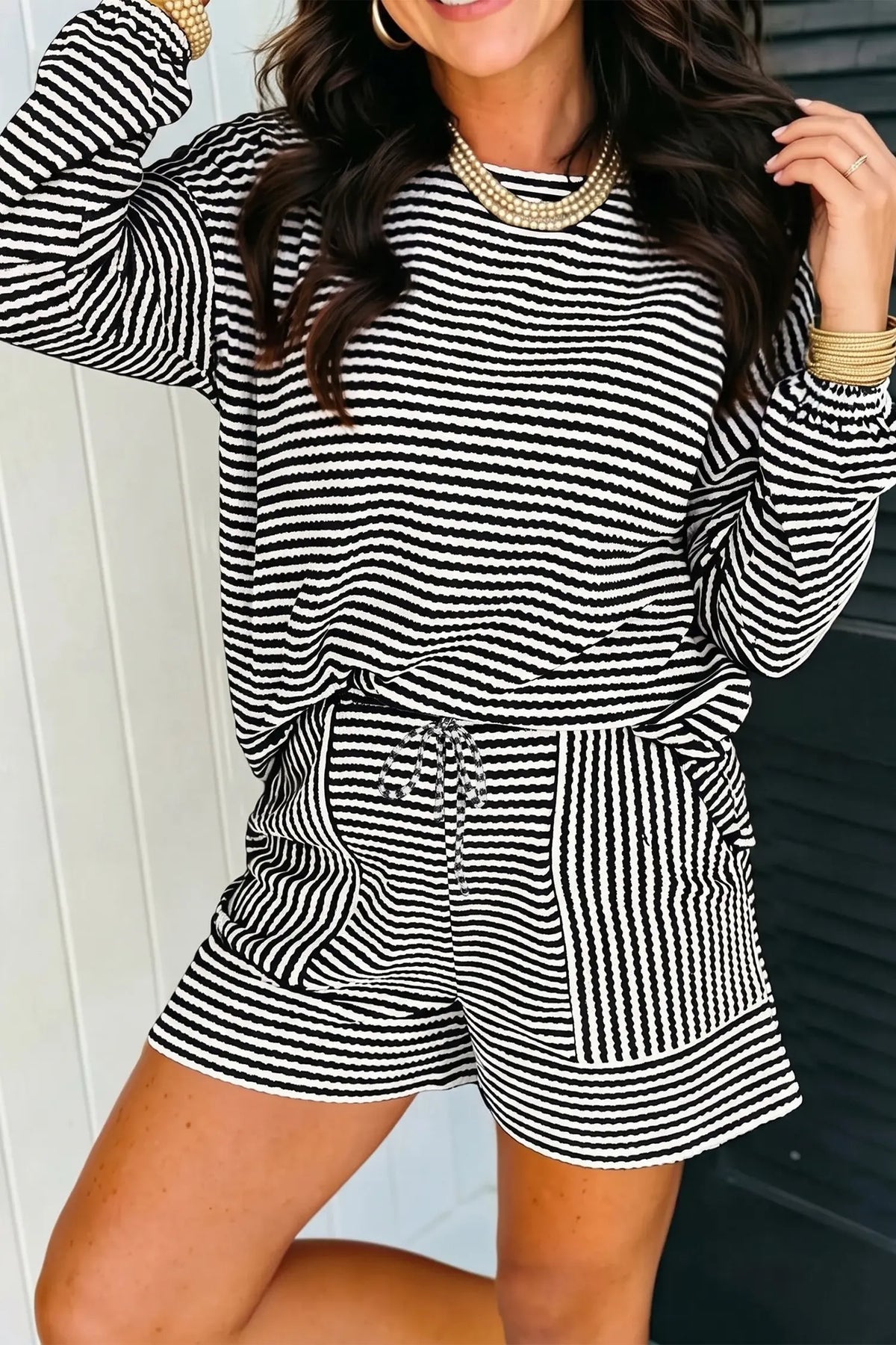 Stripe textured knit long sleeve top and elastic waist shorts set black model front view · nz-alt-v1
