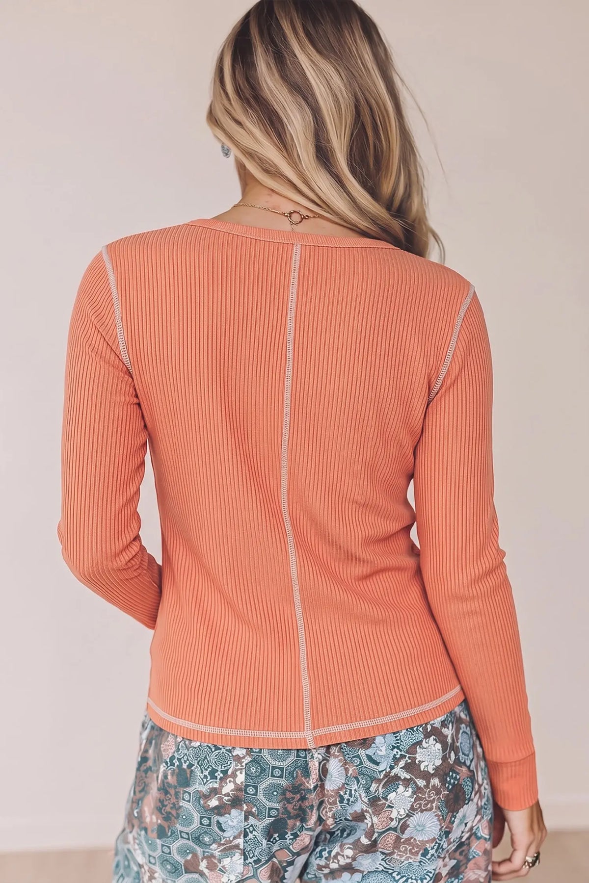 V neck ribbed stitched detail long sleeve top flamingo model back view · nz-alt-v1
