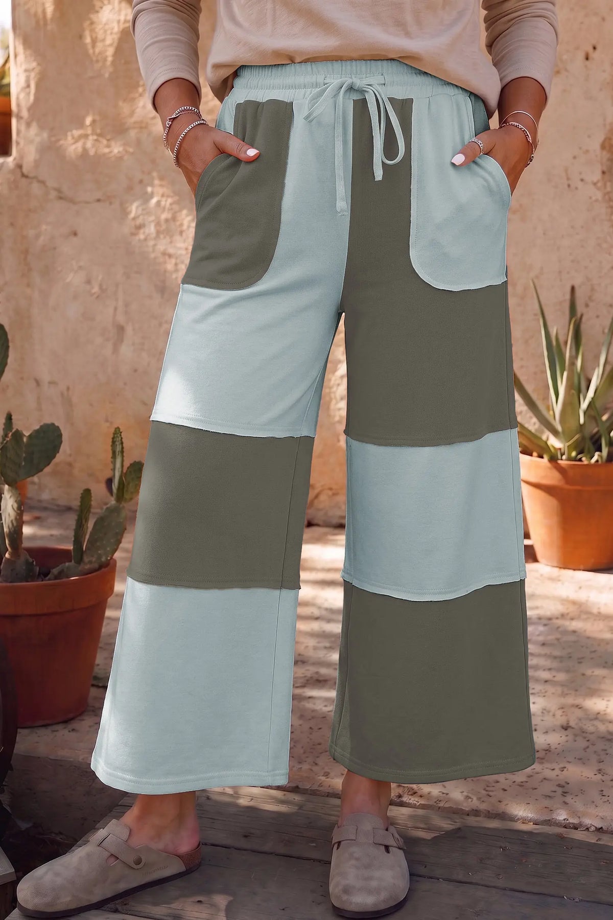 Beau Blue raw seam colorblock wide leg ankle length casual pants model front view · nz-alt-v1