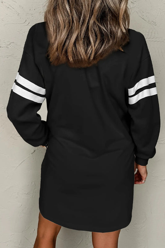 Black sequin ghost varsity striped sleeve Halloween sweatshirt dress model back view · nz-alt-v1