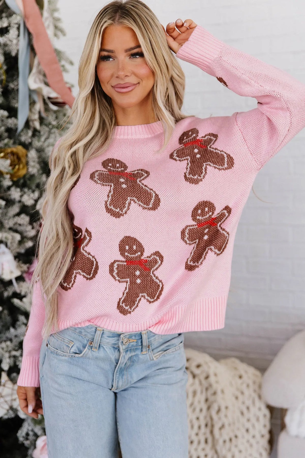 Pink Gingerbread Pattern Round Neck Long Sleeve Shift Sweater model front view · nz-alt-v1
