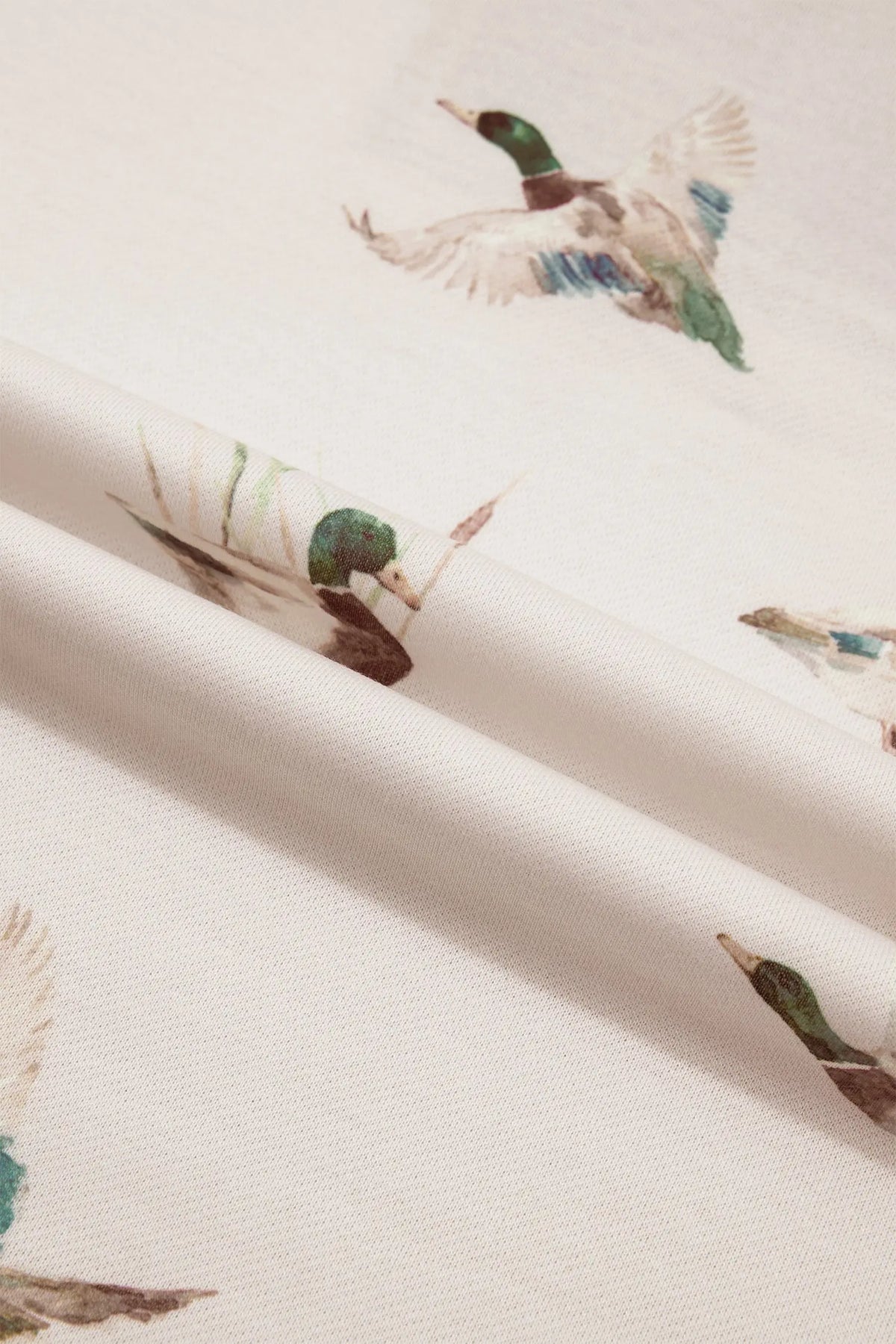 Khaki mallard print fabric close-up, detail view · nz-alt-v1