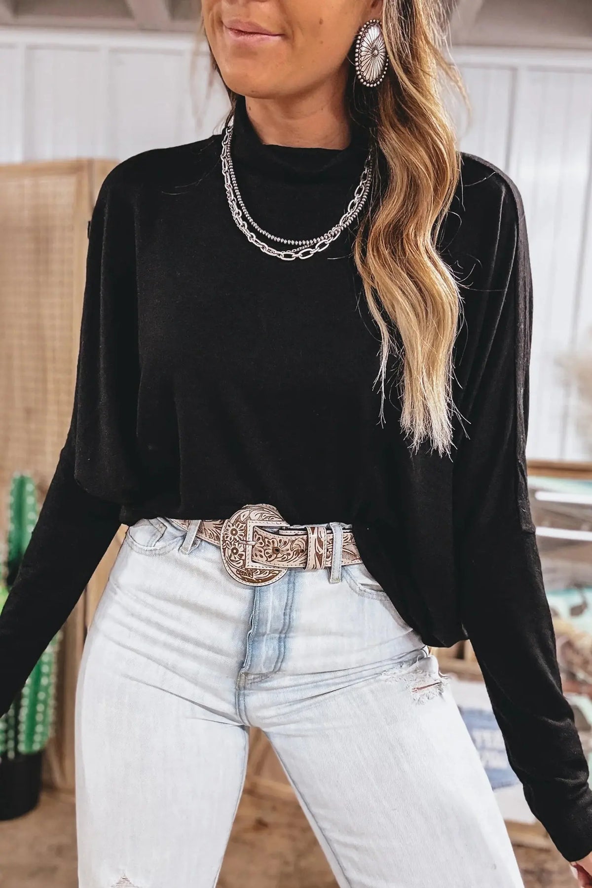 Black High Neck Long Sleeve Top model front view · nz-alt-v1