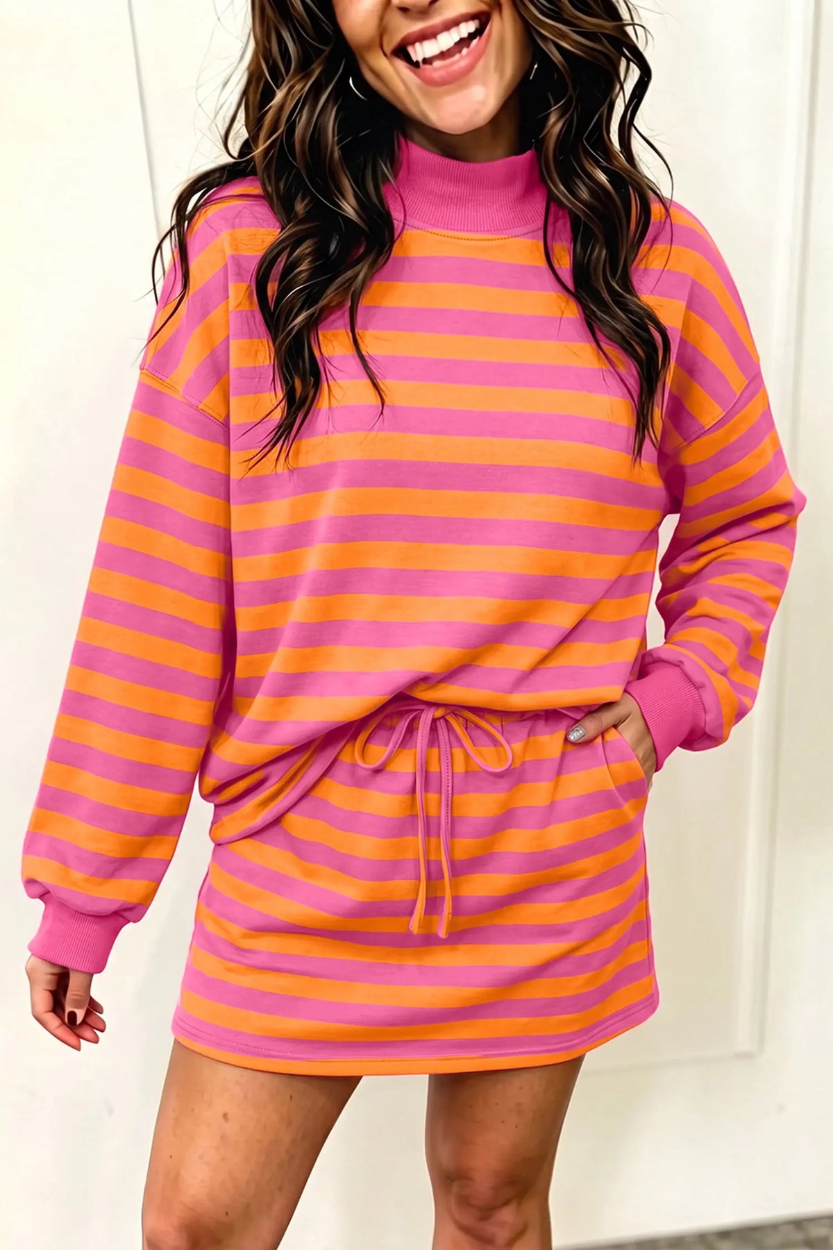 Orange stripe color block patchwork mock neck pullover drawstring mini skort set model front view · nz-alt-v1
