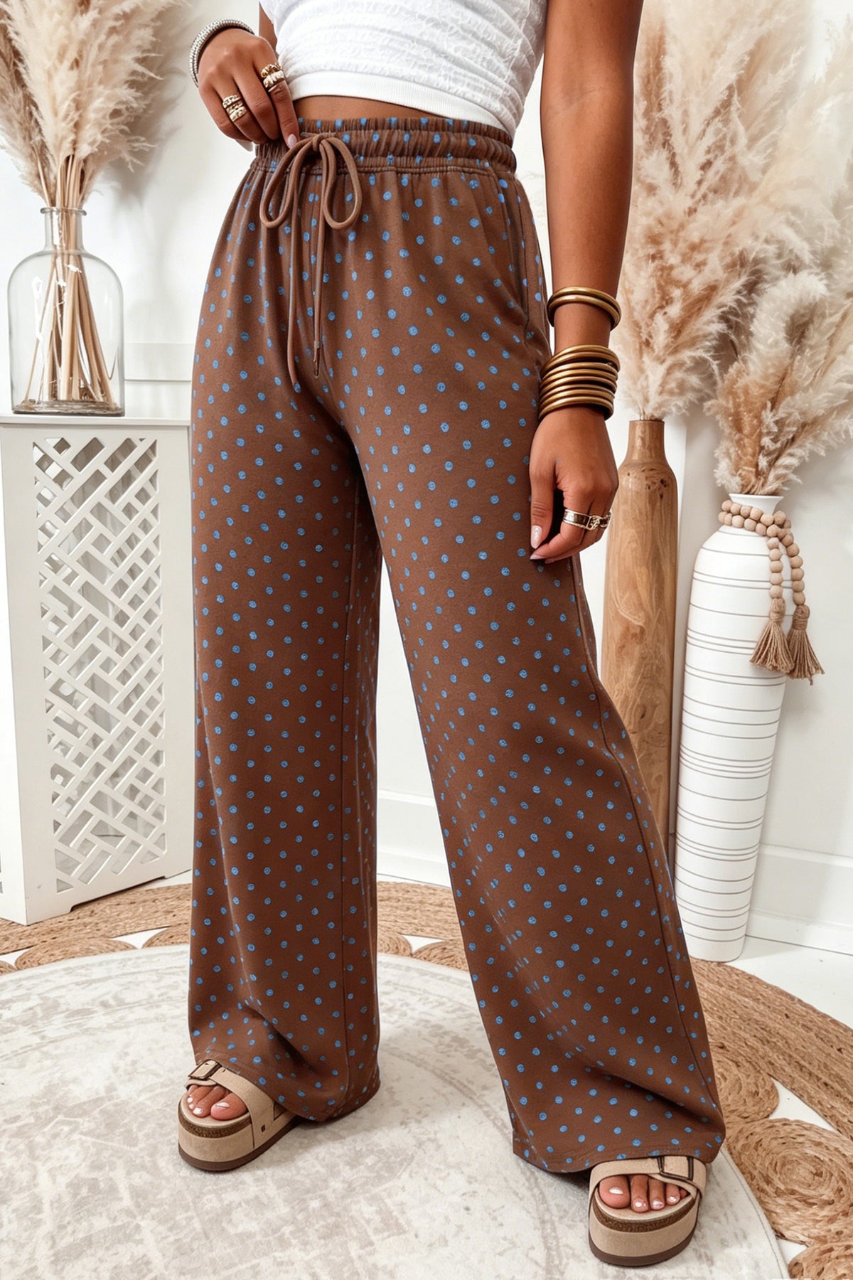 Brown casual polka dot wide leg drawstring pants model front view · nz-alt-v1