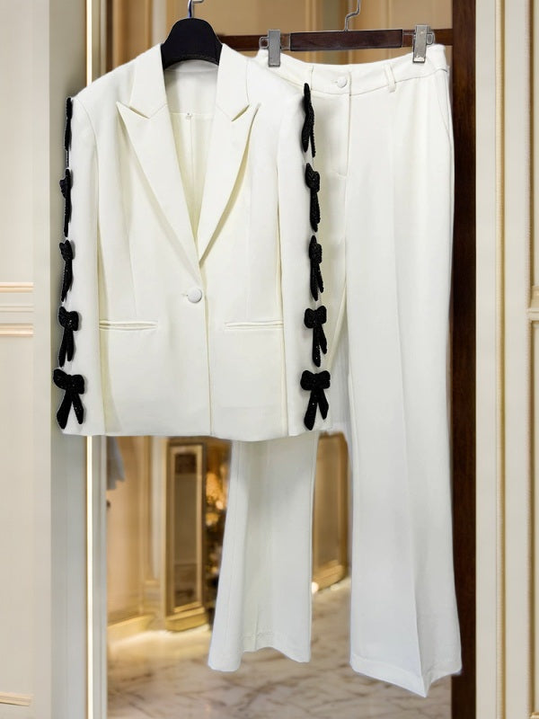 Bow-Trim Blazer and Flare Trouser Set in Ivory hanging view · nz-bg-v1