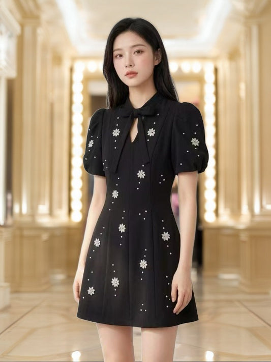 Beaded Daisy Bow-Neck Puff Sleeve Mini Dress model front view · nz-bg-v1