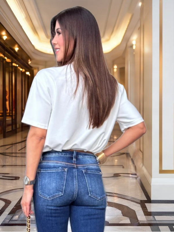 Oversized White Tee with Beaded Bralette Detail model back view · nz-bg-v1
